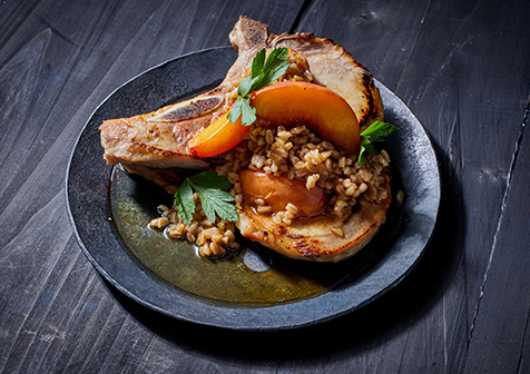 Pork Chops with Peaches, Farro and Burnt Honey Vinaigrette